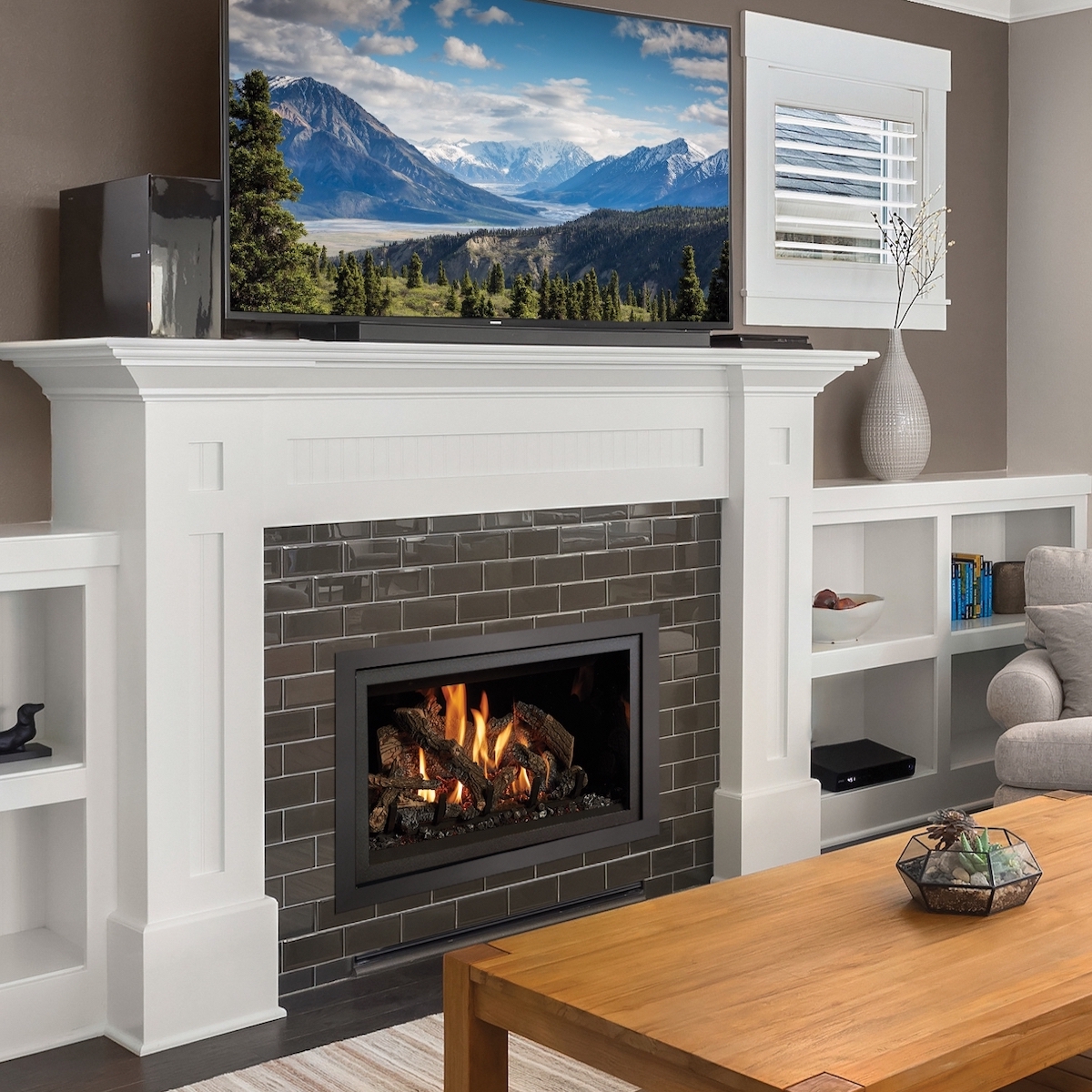 traditional, dark brick fireplace with white mantel
