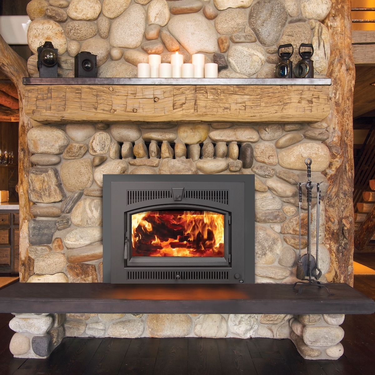 cozy, rock, large  fire-burning fireplace